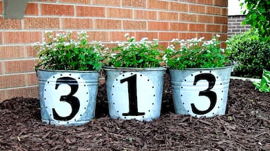 house numbers on metal buckets